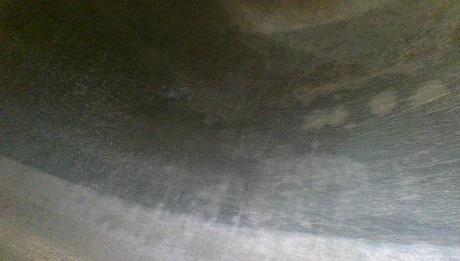 Borescope view of a second cylinder wall quadrant, mostly polished smooth